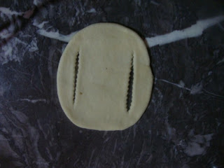 طريقة إعداد بيتزا بشكل جديد شكل رائع بالصور1