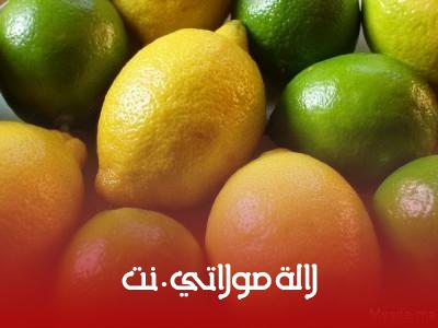 a bowl of limes and lemons